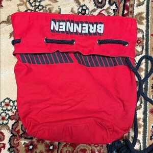 Brennen Red Drawstring Backpack—Bourne Identity Burn Bag